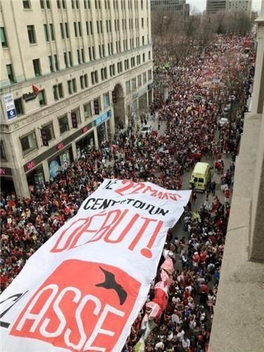 Protest in the streets of downtown Montreal (photo courtesy of Montreal Media Co-op).