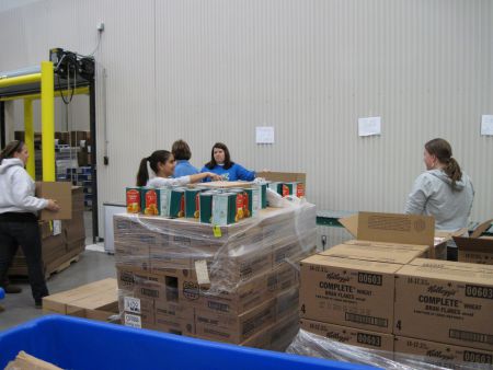 Being poor is hard work. Just a trip to a food bank can mean hours of waiting outside for your turn. Photo Mid-Ohio Food Bank