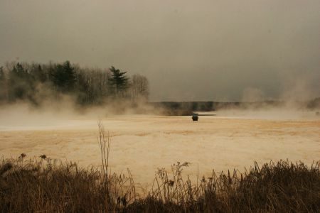 The Aerated Stabilization Basin. When effluent goes in, it tests above CCME Freshwater Aquatic Life guidelines for a variety of metals. There is no monitoring of the effluent when it comes out, just metres from the First Nation community of Pictou Landing. [Photo: Miles Howe]