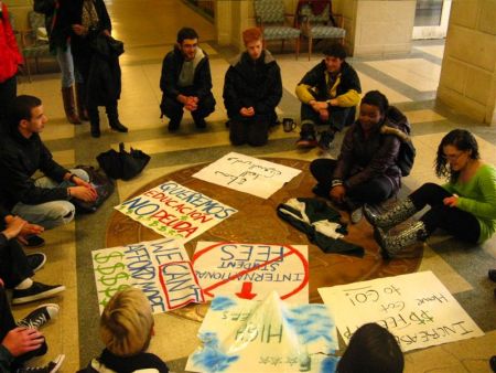 Students circle, planning tactics