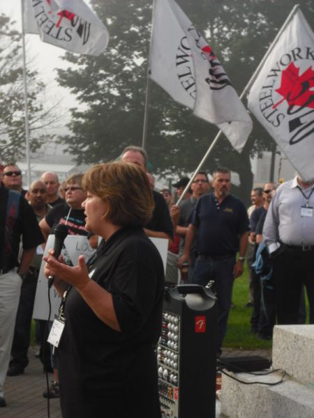 Kim Power speaks to the demonstration.