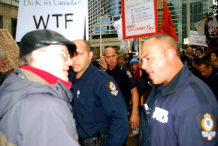 Protestor and police officer