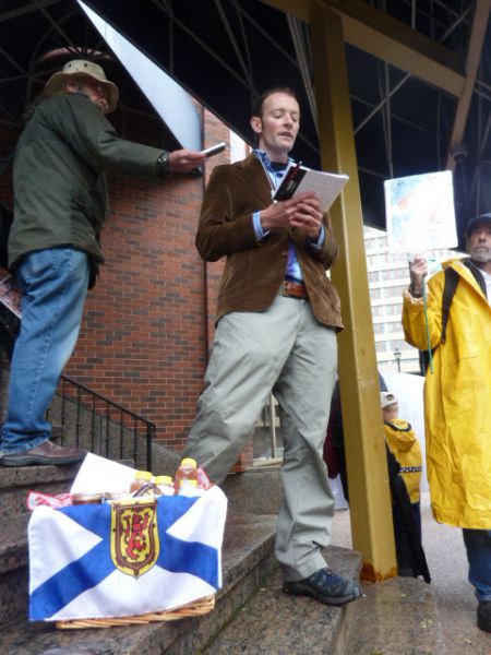 Miles Howe, founder of Peaceful Waters Trading Company, announces his trade mission to Gaza at the World Trade and Convention Centre in Halifax today. photo by Moira Peters