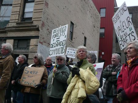 Few smiling faces in the crowd at 'Rally For Our Forests.'  Photo by Hillary Lindsay.