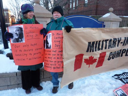 Halifax Peace Coalition participants Helen Lofgren, left, and Roger Davies, right. photo by Moira Peters