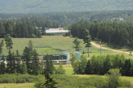 The McCully Gas Plant. The orange flame is a gas flare.