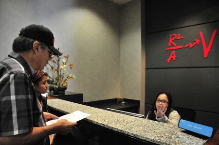 Bryan Parras of TEJAS delivers letter of opposition to SWN Energy in Houston. [Photo: TEJAS]