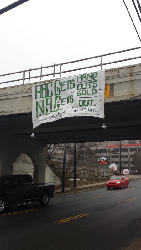 Not My Budget NS drops another anti-austerity budget near the armdale rotary in Halifax. 