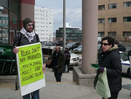 David Parker and Jackie Barkley handing out pamphlets outside the outdoor equipment store in downtown Halifax.