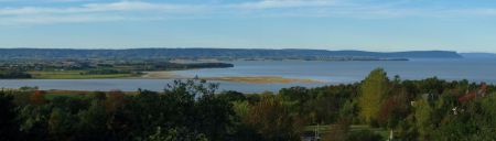 The tidal river empties into the Minas Basin, under the watchful eye of Blomidon. Photo © Marke Slipp