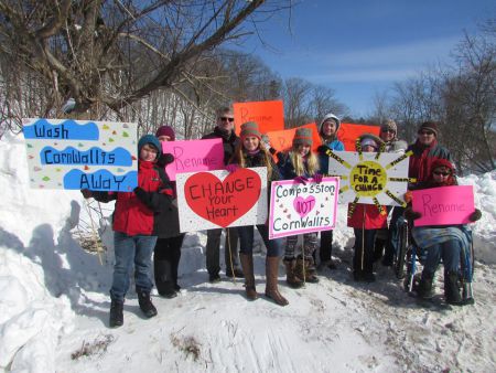 A small group of demonstrators march through Kentville on February 14 to protest the use of Edward Cornwallis' name on public holdings. Photo © Marke Slipp