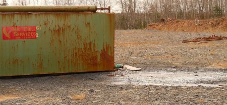 One of the frack-wastewater holding tanks in Kennetcook. Clearly leaking. [Photo: Steve Wendland]