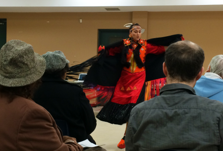 The presentation began with traditional fancy shawl dancing and drumming, followed by performers singing the Mi’kmaq honour song. (Photo by Hilary Beaumont)