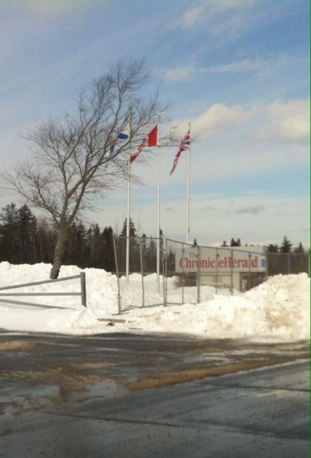 In preparation of a strike or lockout Chronicle Herald owners have erected a fence around its printing facility in Bedford to keep picketers at a distance. Photo facebook 