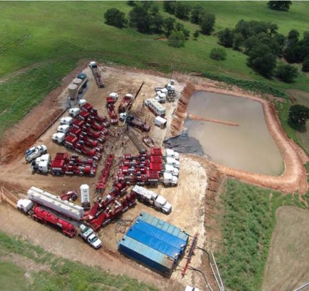 Typical industrial equipment brought in for a single production scale high volume hydraulic fracturing of a shale gas well.