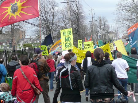 The march and rally were high-energy and filled with music, chanting and dancing.  Many participants were frustrated that the march was re-routed by police from the original route down Spring Garden Road.  Photo: Hillary Lindsay