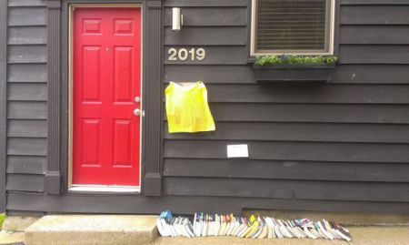 A simple street side intervention for 100 in 1 Day 2014: book swap.  Photo credit: Julia Kemp