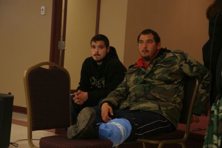 Tyson Peters addresses a crowd today at a community meeting in Elsipogtog. [Photo: Miles Howe]