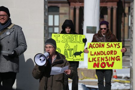 Jesse Laufer on the bullhorn. [Photo: Miles Howe]