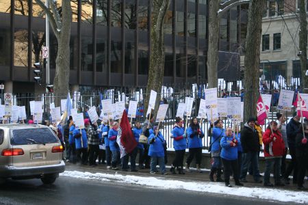 Hundreds of striking Home Support Workers surround the Nova Scotia Legislature.  They were there to protest essential services legislation that NSGEU President Joan Jessome calls draconian.   Photo Robert Devet