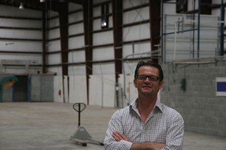 Steve Popple, former Managing Director of Fenestration and Glass, in a now-empty factory. [Photo: Miles Howe]