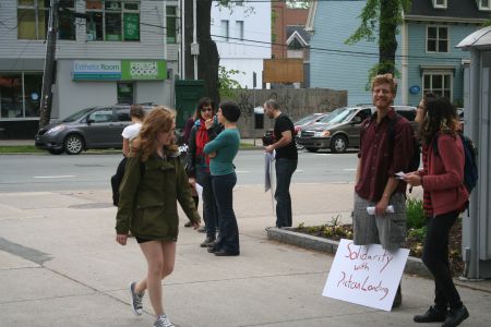 Rather than listen to speeches people talked to passers by and handed out pamphlets. Photo Robert Devet