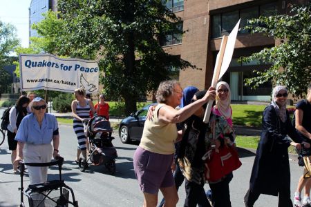 About 70 refugee supporters walked in the Labour Day parade last week to bring attention to the plight of refugees and to demand action from a reluctant federal government. The same organizing group is asking Nova Scotians to join them this Sunday evening for a silent candlelight vigil at Victoria Park in Halifax. Photo Simon de Vet  