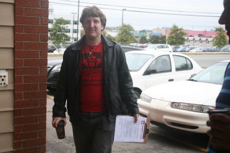 Jonethan Brigley of ACORN Nova Scotia has a letter  for his landlord. The anti-poverty group wants MetCap Living to stop neglecting repair and security concerns.  Photo Robert Devet