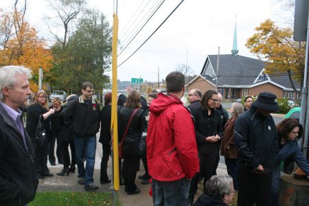 Staff gathered on the sidewalk in front of the Chronicle Herald building to protest the announced layoff of twenty newsroom workers. An additional six positions were lost to early retirements. Cuts of this magnitude will make it difficult to continue to deliver news to Nova Scotians, they fear. Photo Robert Devet