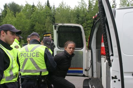 Patles taken into custody. [Photo: M. Howe]