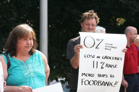 Suggestions by Community Services that people on assistance are better off than we think and that more people on assistance need to join the labour force has activists concerned. Pleas to raise welfare rates, as at this rally earlier in the year, appear to fall on deaf ears. Photo Robert Devet