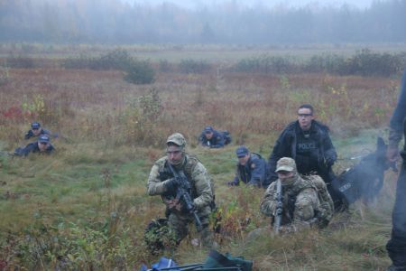 An Access to Information request shows that requests for military negotiating assistance were twice made by the Mi'kmaq Warrior Society, weeks before the hundreds-strong RCMP raid of October 17th, 2013. In one instance, the Assembly of First Nation Chiefs in New Brunswick, an incorporated body receiving tens of thousands of dollars from Southwestern Energy Resources Canada, instruced the Canadian Armed Forces that the Warrior Society "did not represent" First Nations peoples. [Photo: Miles Howe]