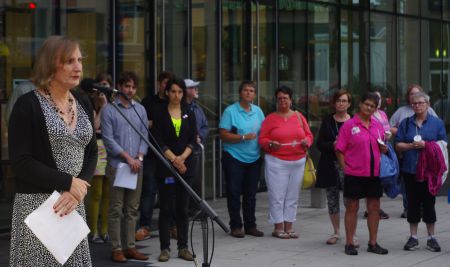 Halifax Pride Parade Grand Marshall, Kate Shewan, speaking at the International Candlight Vigil. 