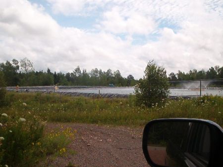 Lagoon in Debert full of fracking wastes, which Colchester County refused to allow in their sewage system. Windsor sewage treatment plant maybe? [Author photo]