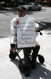 Kevin. He's come to hold a sign and leaflet every day for 10 days.