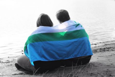 Jordan Brown and his wife LeeAnn Toomashie used the Labrador flag in a recent photo shoot before their wedding. Photo by Jenna Mouland.