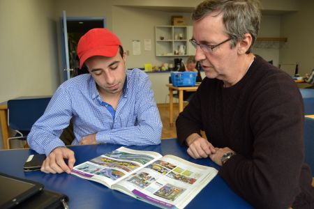 Mohammed Yanes (left) spends a few hours a week with one-on-one English tutor Kevin Hall (right) thanks to the library’s English Language Learning Program. The library is searching for more volunteers to meet the demand of Syrian refugees moving to HRM neighbourhoods. [Photo: Chris Muise]