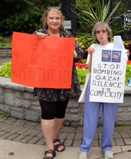 Sharon and Linda with their signs.