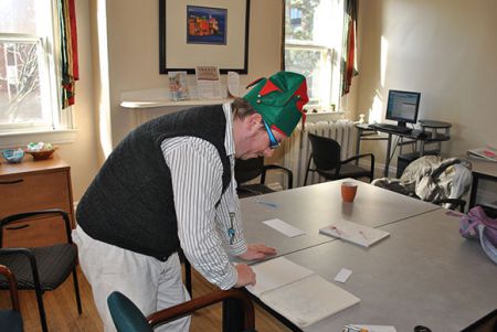 Allistair Fraser shows off his skecthbook at the Nova Scotia Austism Centre 