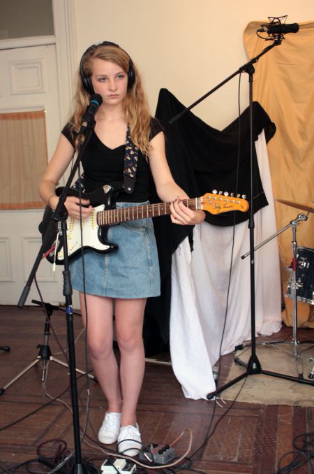 A girl records a song at the Rebel Girl Rock Camp. (Photo by Hilary Beaumont)