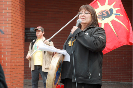 Dorene Bernard makes a speech at the 6th annual Tanya Brooks Memorial Walk. [Photo: Rebecca Hussman]