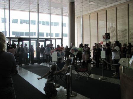 Shale gas opponents gather in the lobby of the Centennial Building in Fredericton on August 11, 2011. Photo: Tracy Glynn.