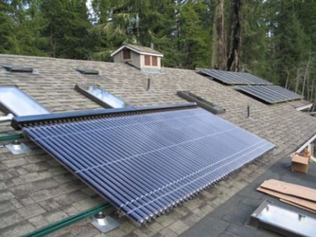 An evacuated-tube solar hot water heater on a roof.