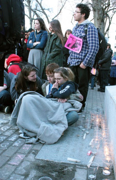 Young men and women mourn together at a vigil in Halifax for Rehtaeh Parsons earlier this spring. (Hilary Beaumont photo)