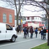 Police direct organizers to steer the marchers to the cxenter of the street