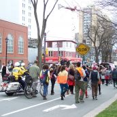 The crowd is bookended by police and escorted the final portion of the march