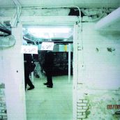 Province House: Unidentified people, probably an insurance representative and engineer, inspect the basement. (Photo: Courtesy of the province)