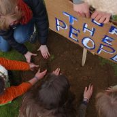 Everyone joins in to plant.