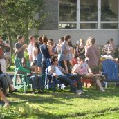 Community members mingle and share food provided by Campus Action on Food.