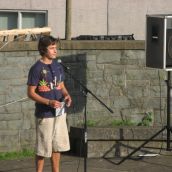 CAF member Quincy Russell addressed the crowd, announcing workshops on container gardening and seed bomb making. Seed bombs are seeds encased in clay spheres.